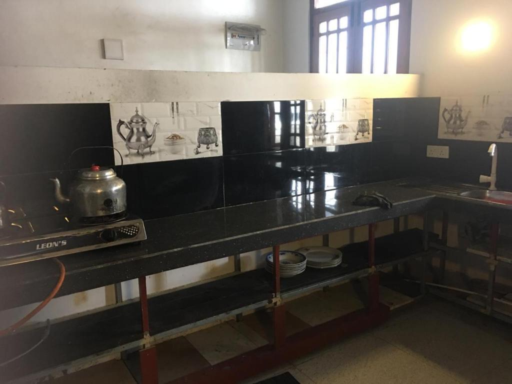 Kuchyň nebo kuchyňský kout v ubytování Jayamasa Lucy Home