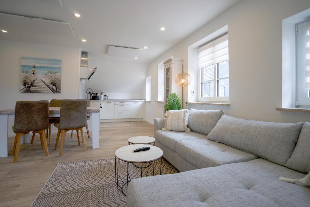 Χώρος καθιστικού στο Himmelreich - Helle & moderne Ferienwohnung am Meer