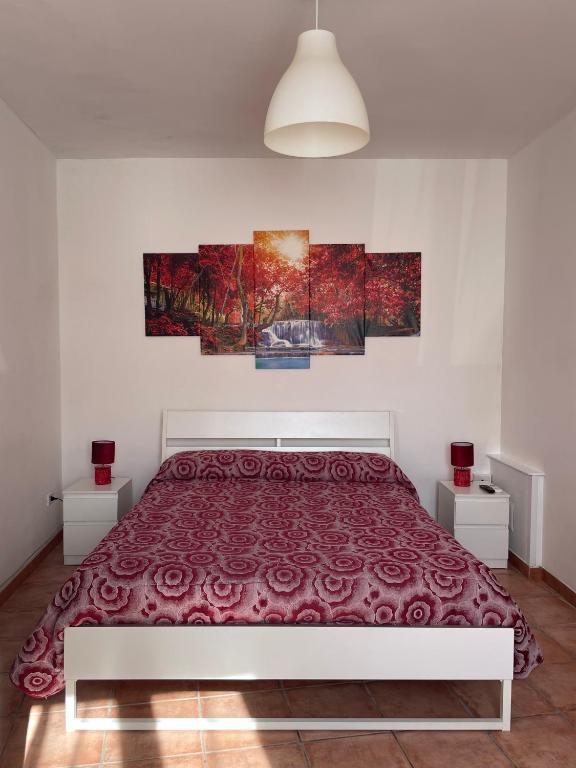 Postel nebo postele na pokoji v ubytování Scibetta's B&B