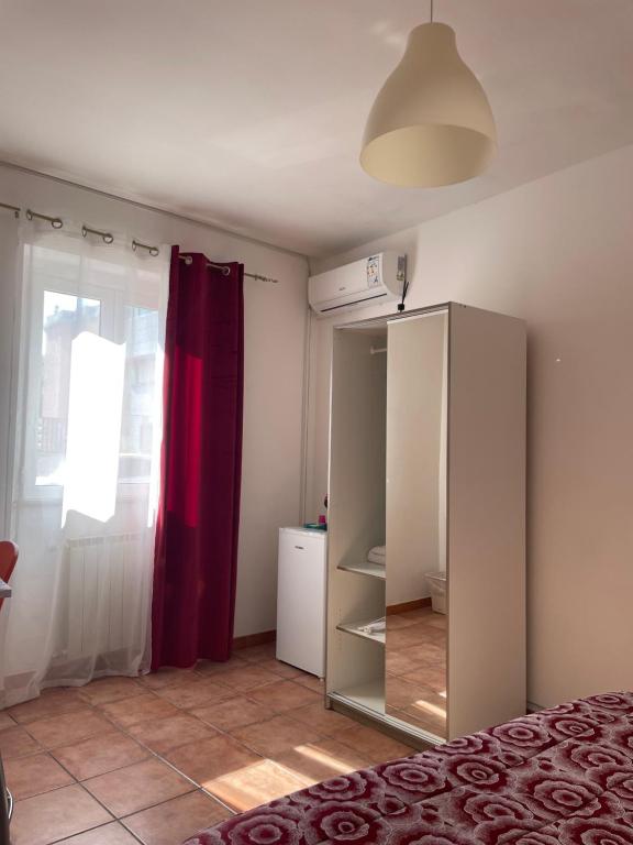 Postel nebo postele na pokoji v ubytování Scibetta's B&B