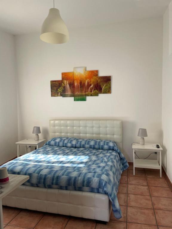 Postel nebo postele na pokoji v ubytování Scibetta's B&B
