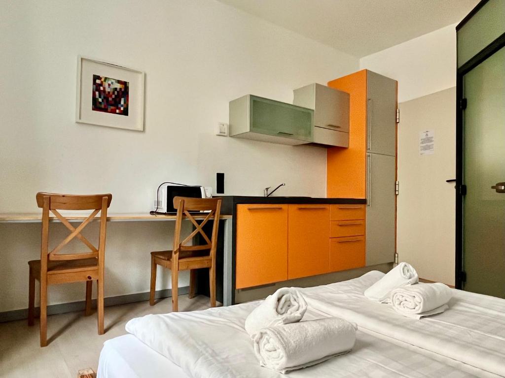 Postel nebo postele na pokoji v ubytování GuestHouse University by LR - self check in