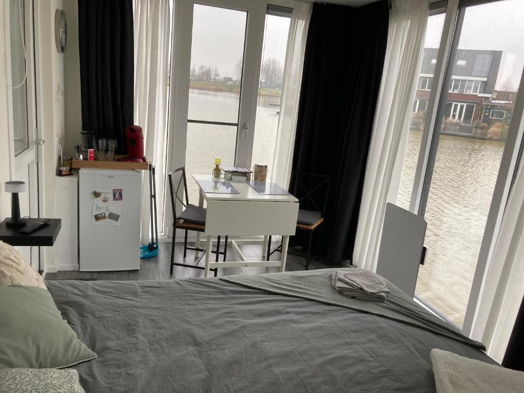 Postel nebo postele na pokoji v ubytování Bed & Breakfast ‘t Westergouwertje