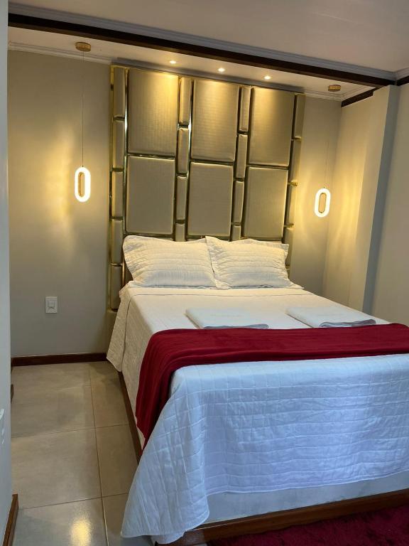 Voodi või voodid majutusasutuse Pousada Meireles toas