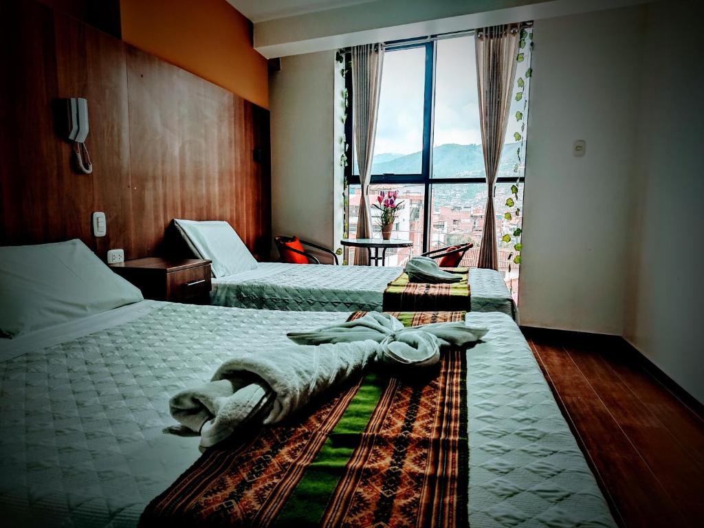Postel nebo postele na pokoji v ubytování Velvet residence