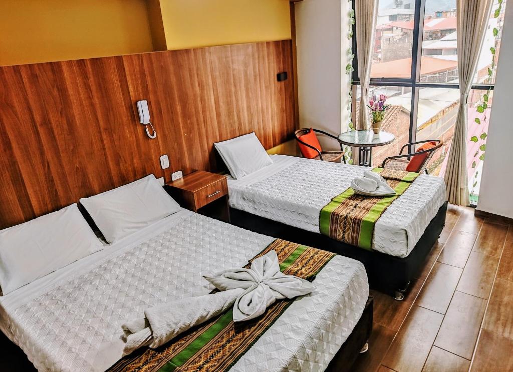 Postel nebo postele na pokoji v ubytování Velvet residence