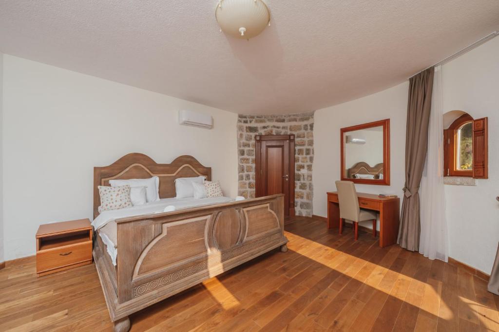 Postel nebo postele na pokoji v ubytování Apartments Pietra Mare