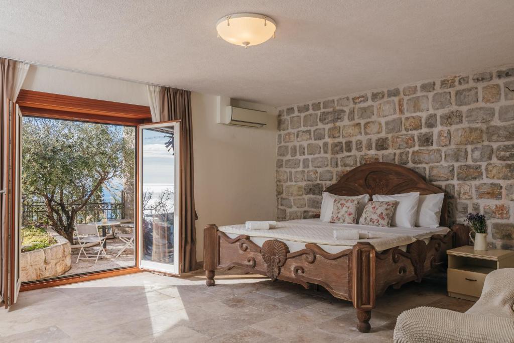 Postel nebo postele na pokoji v ubytování Apartments Pietra Mare