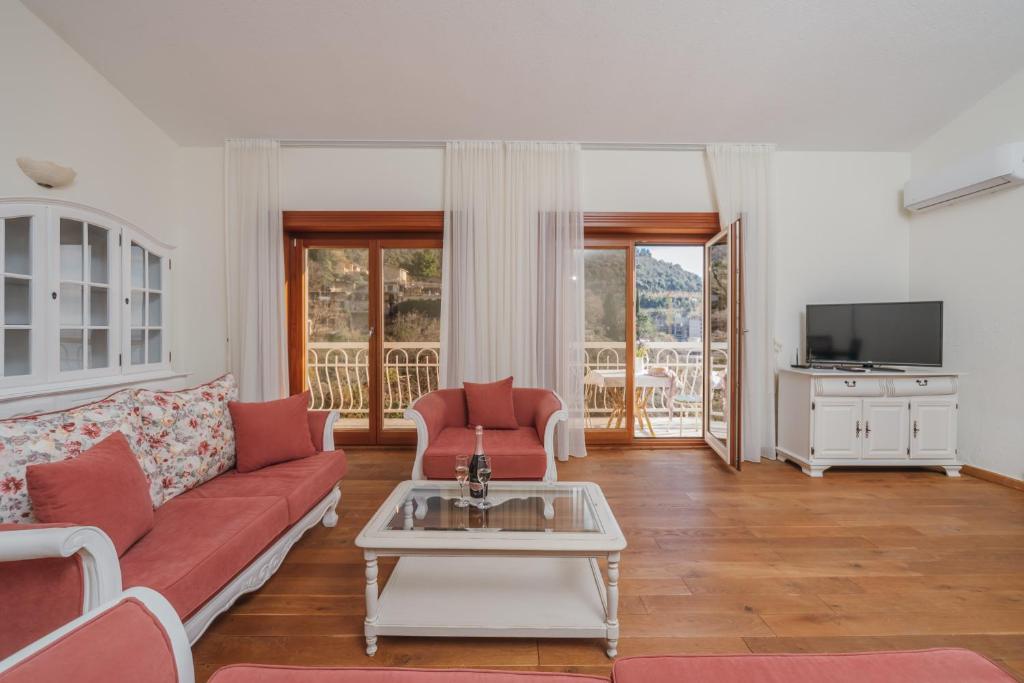 TV a/nebo společenská místnost v ubytování Apartments Pietra Mare