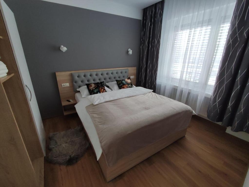 Ένα ή περισσότερα κρεβάτια σε δωμάτιο στο Apartments33Mario