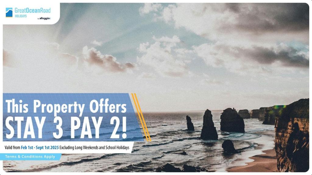 a sign that reads this property offers stay pay at Beachside At Breakers in Lorne