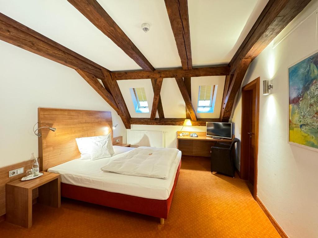 Postel nebo postele na pokoji v ubytování Hotel Haimerlhof