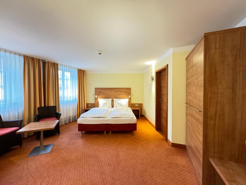 Postel nebo postele na pokoji v ubytování Hotel Haimerlhof