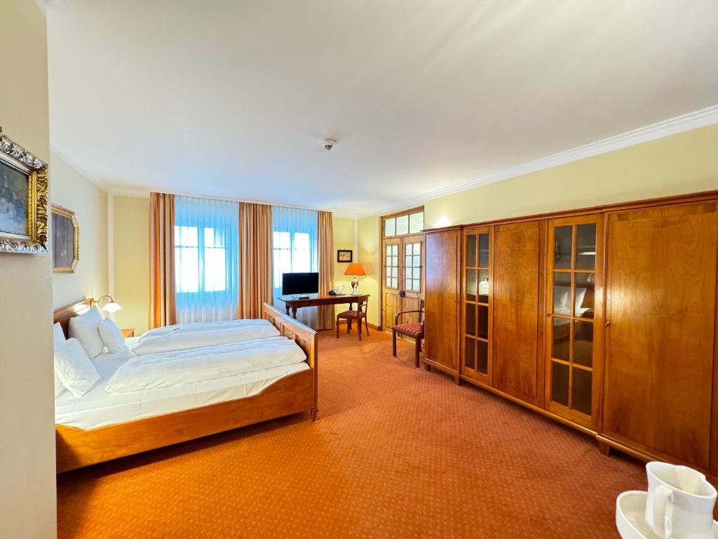 Postel nebo postele na pokoji v ubytování Hotel Haimerlhof