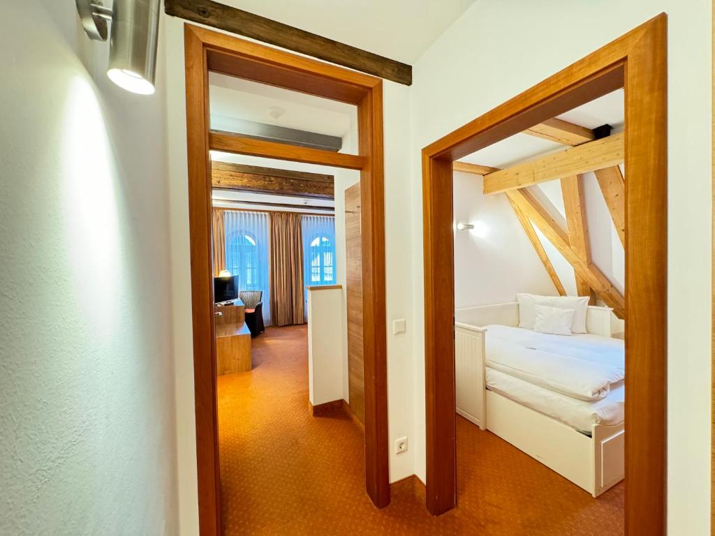 Postel nebo postele na pokoji v ubytování Hotel Haimerlhof