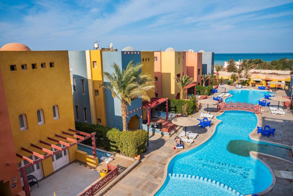 an aerial view of a resort with a swimming pool at Al-Dora Resort Hurghada in Hurghada