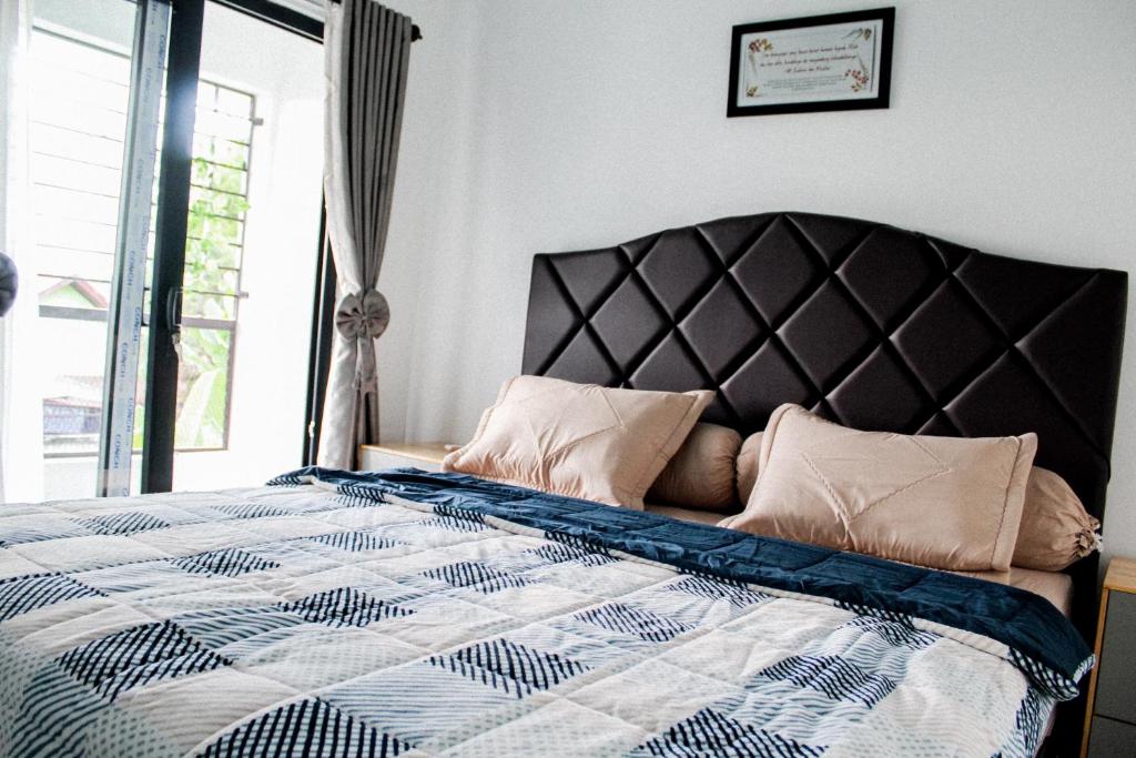 Hayy Homestay - Habitación Doble Deluxe (2 Adultos + 1 Niño)