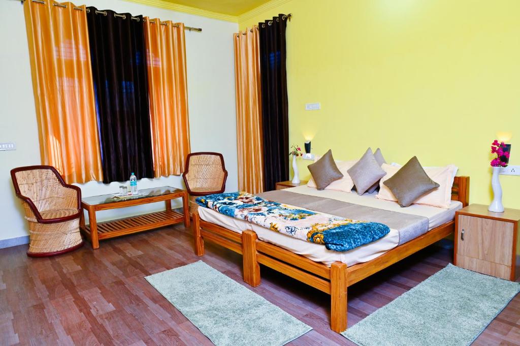 Postel nebo postele na pokoji v ubytování Hotel Dev Banar