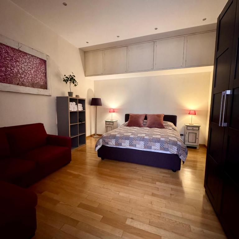 A bed or beds in a room at Roma Da Noi Suite