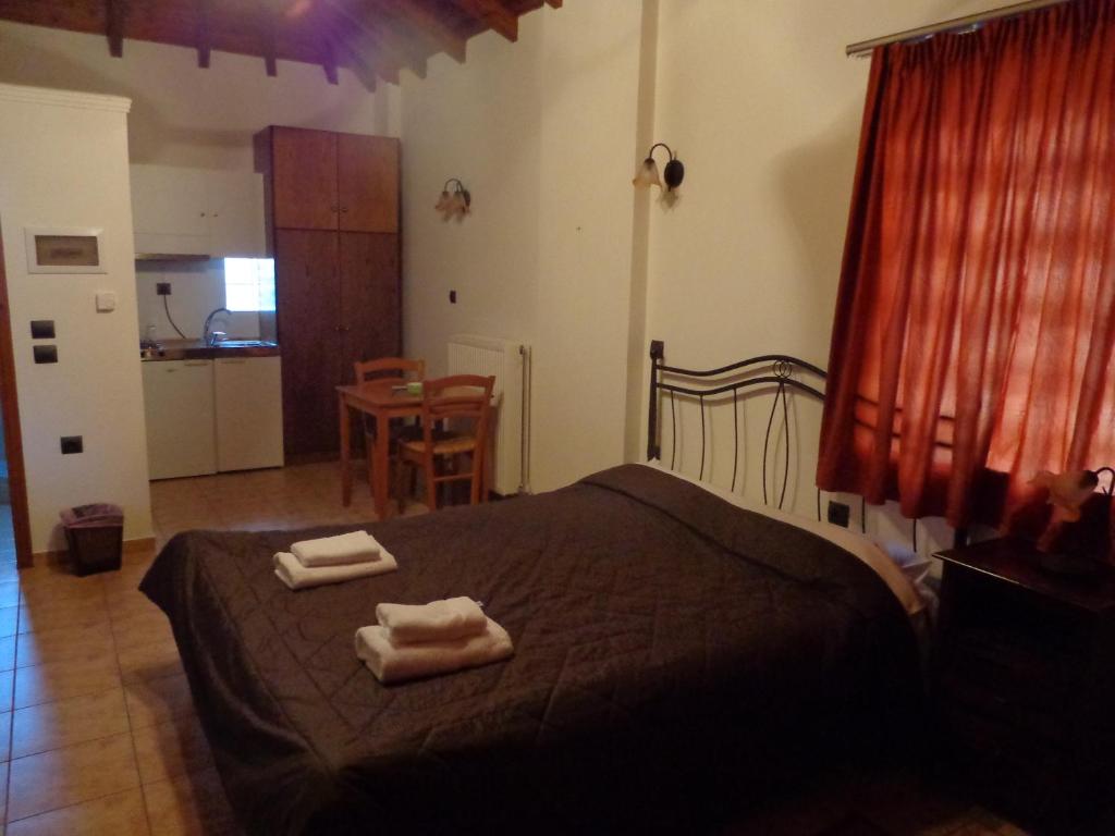 Postel nebo postele na pokoji v ubytování Alonaki Guesthouse
