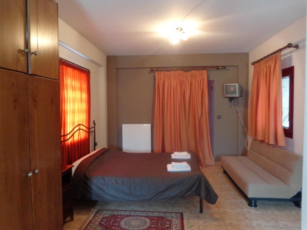 Postel nebo postele na pokoji v ubytování Alonaki Guesthouse