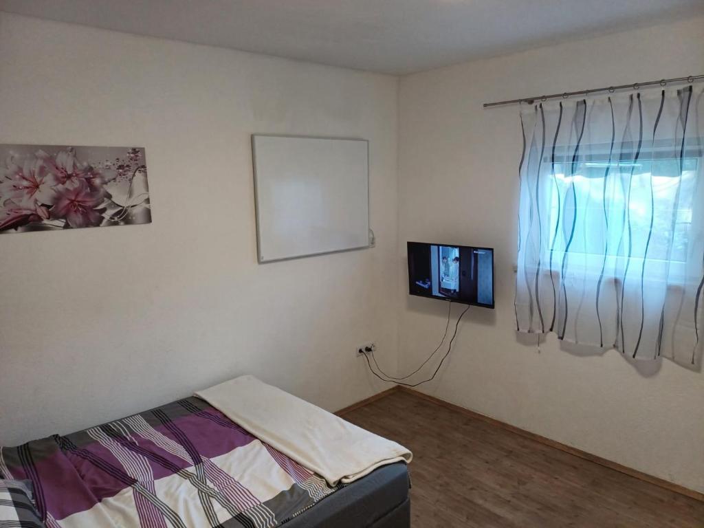 TV a/nebo společenská místnost v ubytování Haus mit 2 Schlafzimmer in Voitsberg