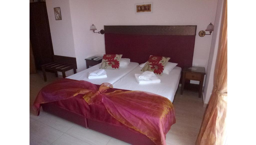 Postel nebo postele na pokoji v ubytování Galini Sea Apartments