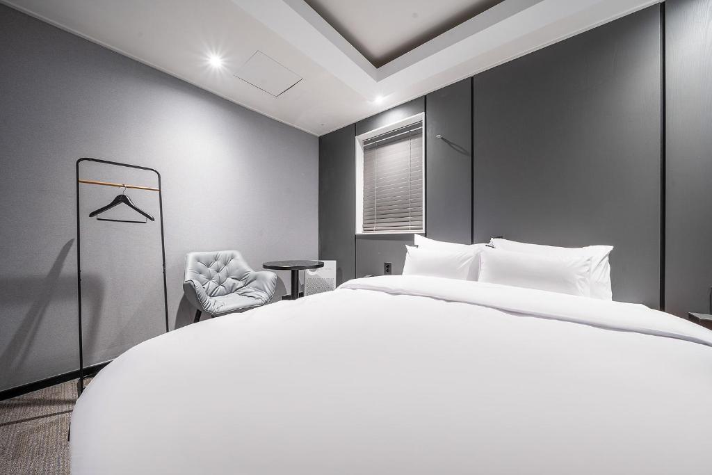 Postel nebo postele na pokoji v ubytování Story 9 Hotel