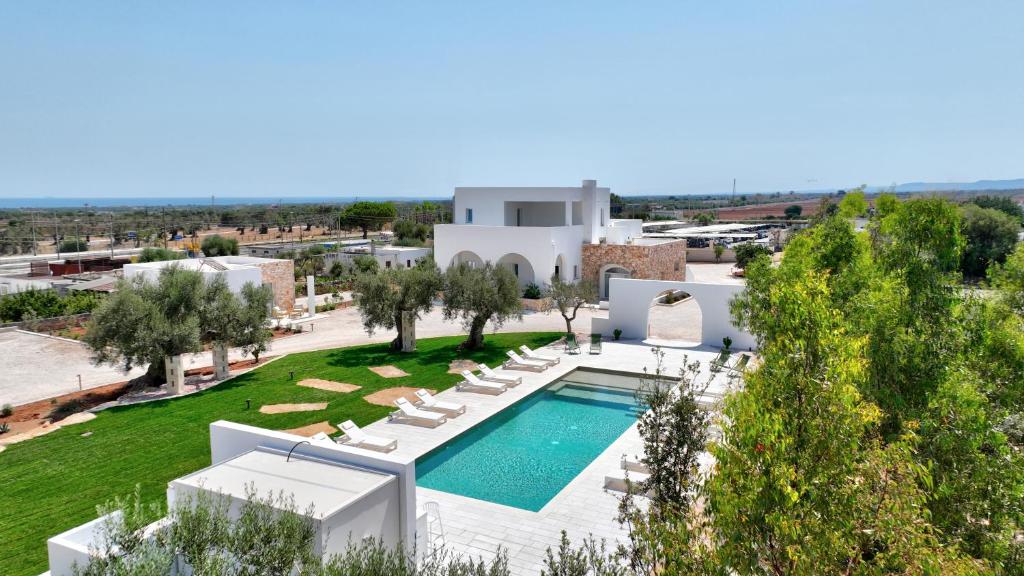an aerial view of a villa with a swimming pool at Borgo Tufaia in Fasano