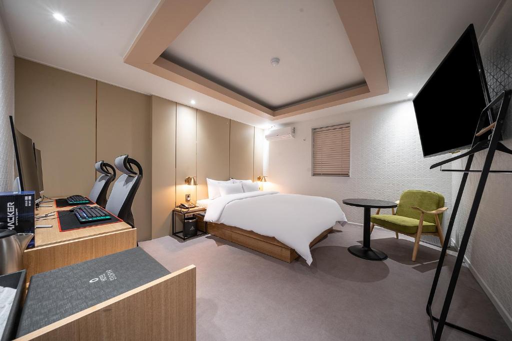 Postel nebo postele na pokoji v ubytování Story 9 Hotel