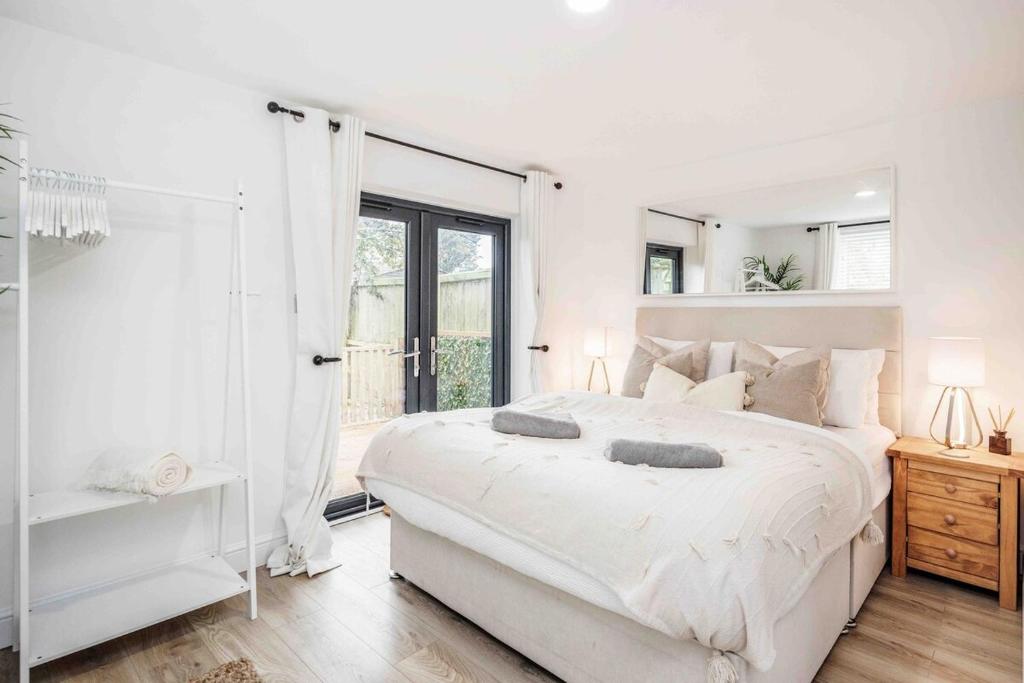 Postel nebo postele na pokoji v ubytování The Nook