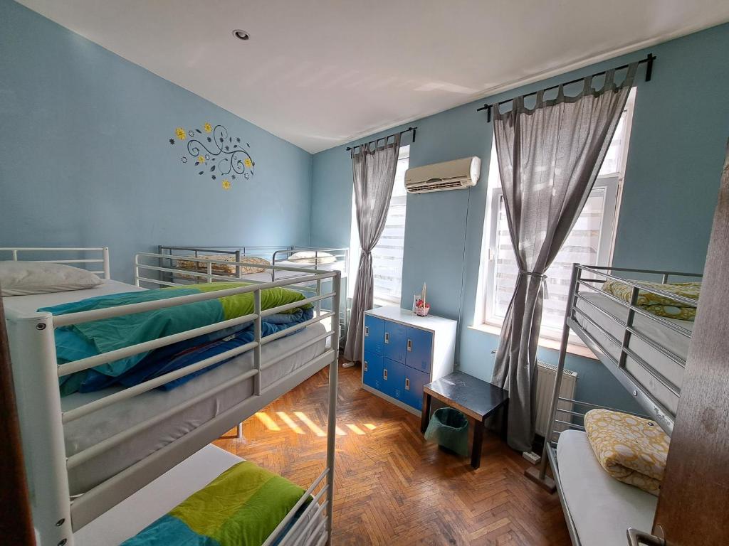 Postel nebo postele na pokoji v ubytování FunHouse