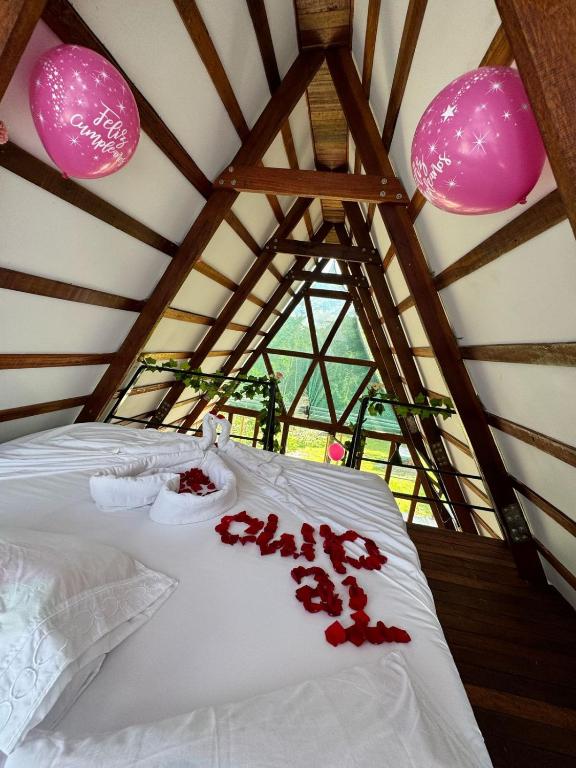Voodi või voodid majutusasutuse Glamping RanchoEmilio toas