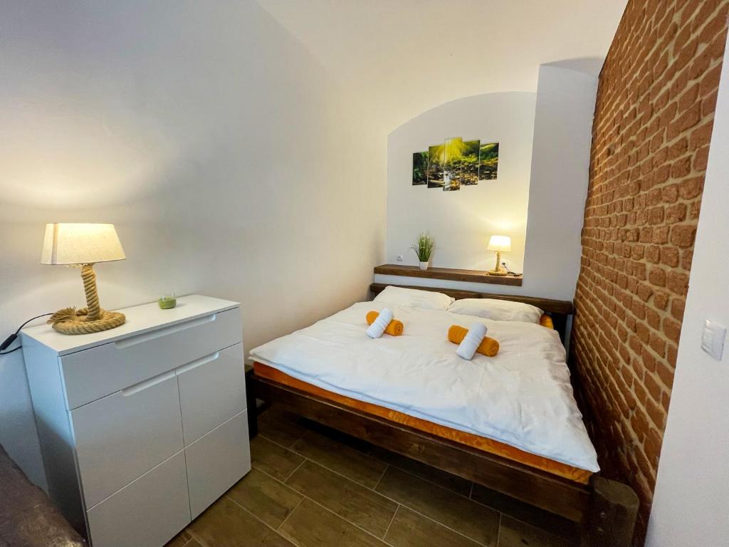 Postel nebo postele na pokoji v ubytování Apartmány 13 Přízemí 1