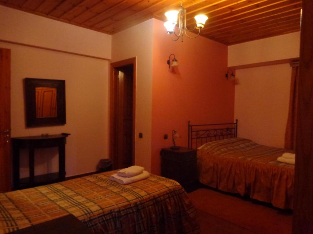 Postel nebo postele na pokoji v ubytování Alonaki Guesthouse