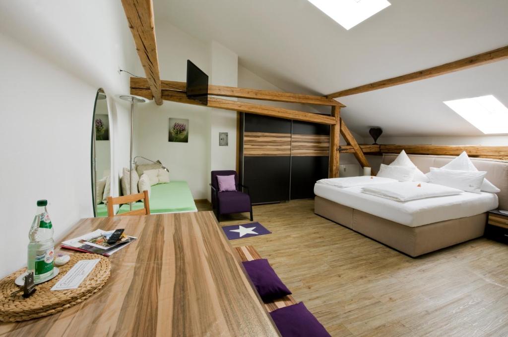 Postel nebo postele na pokoji v ubytování Monello Apartments - Charmanter Altbau
