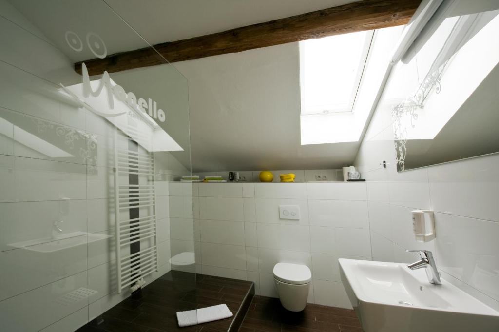 Koupelna v ubytování Monello Apartments - Charmanter Altbau