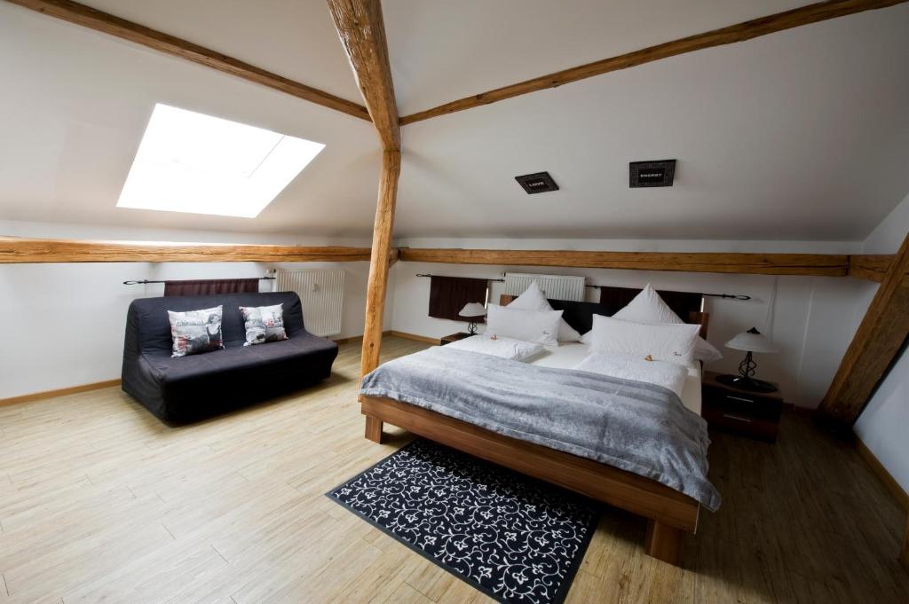Postel nebo postele na pokoji v ubytování Monello Apartments - Charmanter Altbau