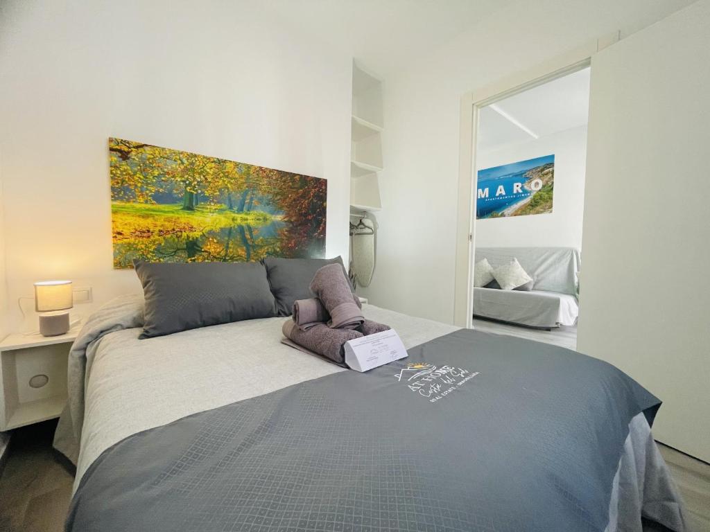 Ένα ή περισσότερα κρεβάτια σε δωμάτιο στο Apartamento Jimena Maro en el centro de Nerja