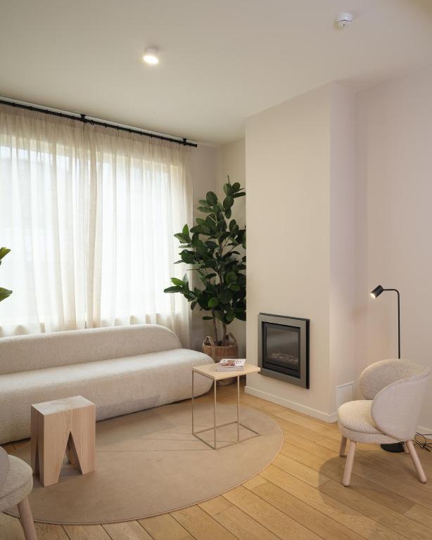 Posezení v ubytování Lits de Lo - Boutique Rooms