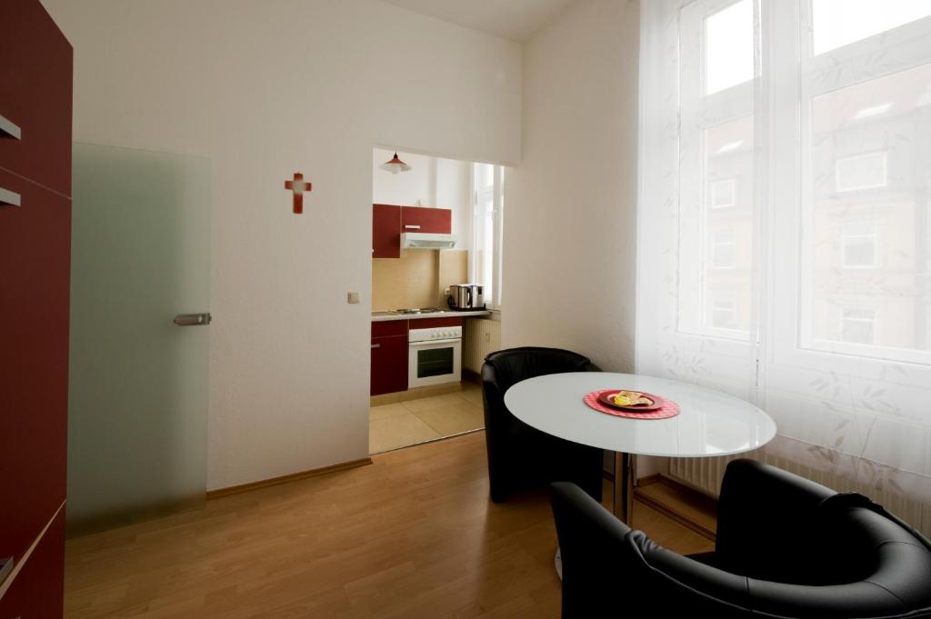 Kuchyň nebo kuchyňský kout v ubytování Monello Apartments - Charmanter Altbau