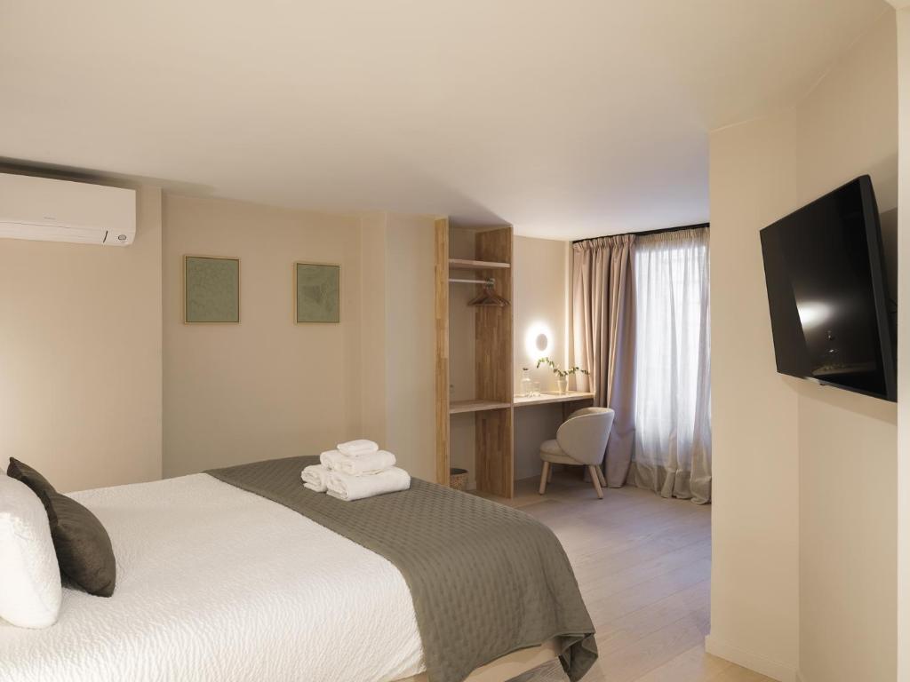Postel nebo postele na pokoji v ubytování Lits de Lo - Boutique Rooms