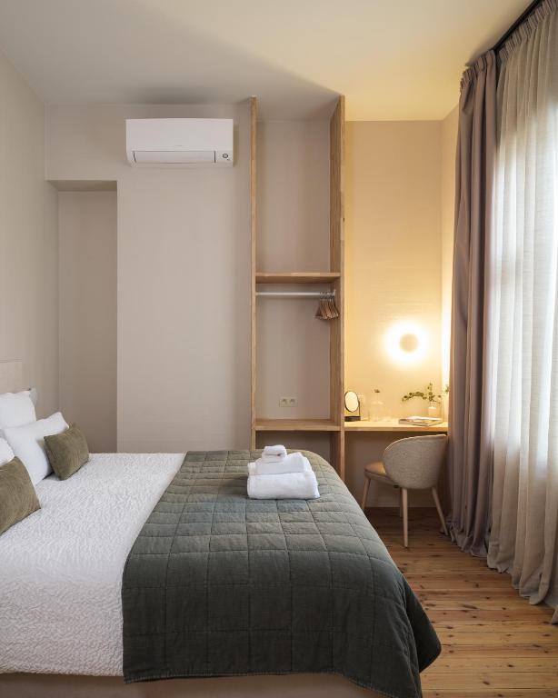 Postel nebo postele na pokoji v ubytování Lits de Lo - Boutique Rooms