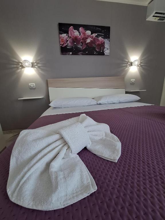 Postel nebo postele na pokoji v ubytování Casa Vacanze Belvedere