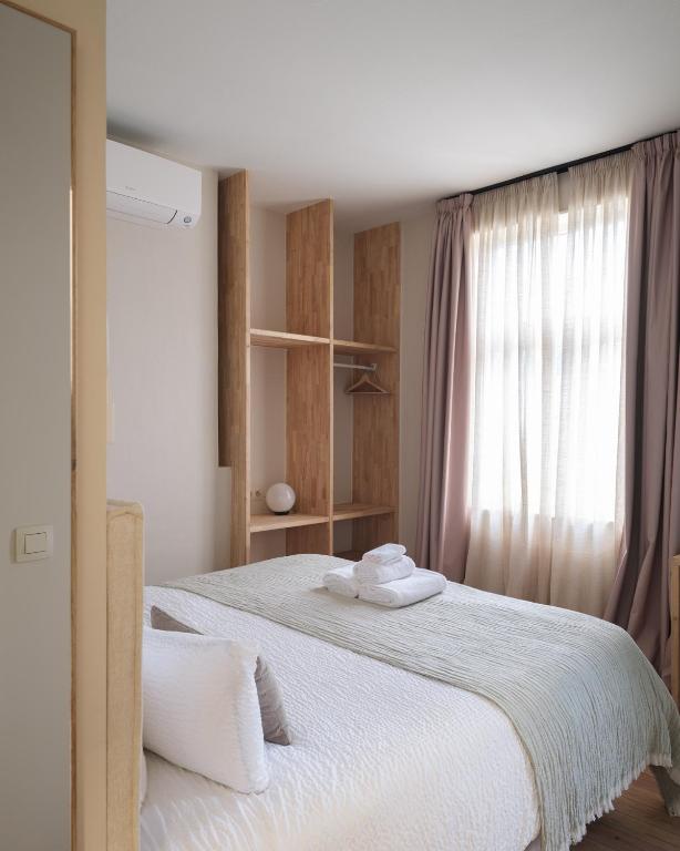 Postel nebo postele na pokoji v ubytování Lits de Lo - Boutique Rooms