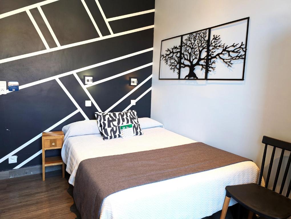 Postel nebo postele na pokoji v ubytování H33 Hôtel