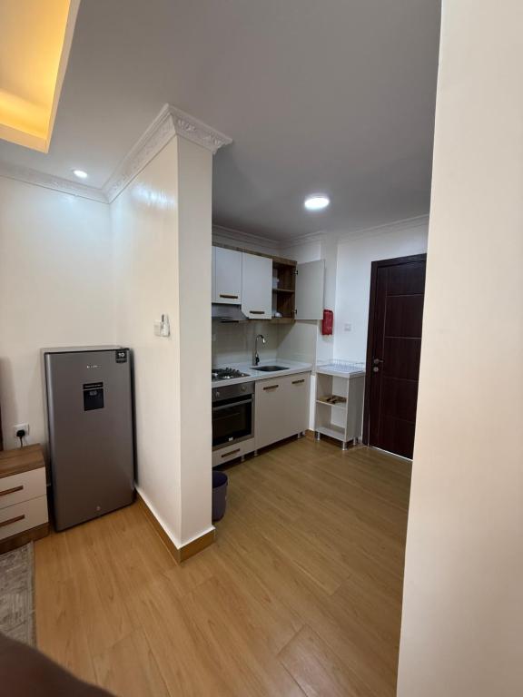 Kuchyň nebo kuchyňský kout v ubytování Cascadia Apartments Kigali