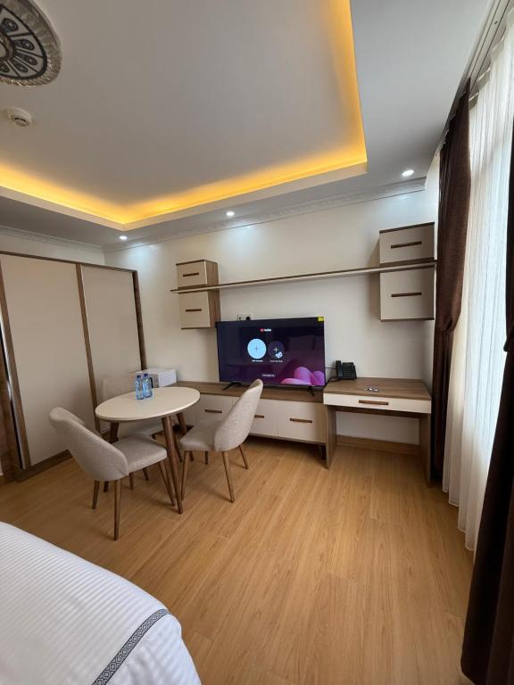 Postel nebo postele na pokoji v ubytování Cascadia Apartments Kigali