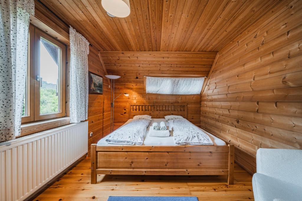 Postel nebo postele na pokoji v ubytování Dachstein Chalet - Mountain view