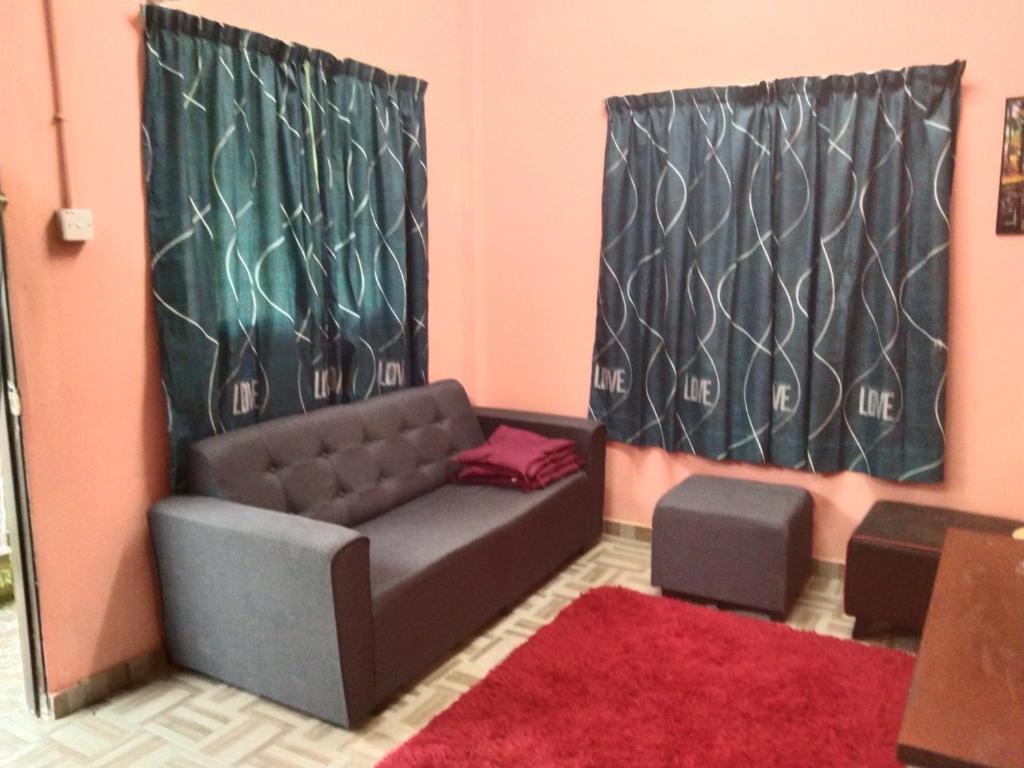 Posezení v ubytování Putat Gajah Villa PASIR MAS